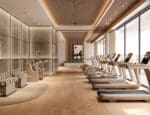 Academia de luxo equipada com aparelhos Technogym Artis Luxury, ambiente sofisticado com iluminação natural e design contemporâneo.